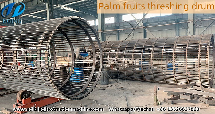 Palm fruits threshing machine.jpg
